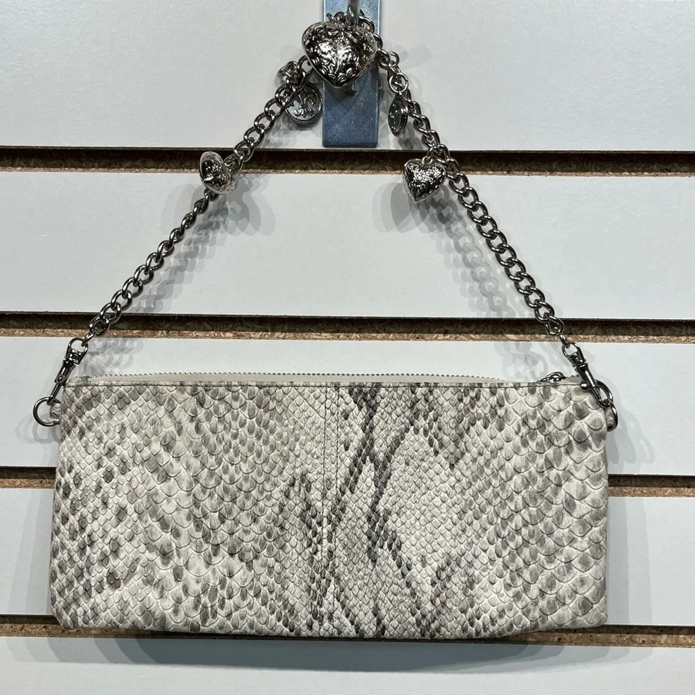 Kathy Van Zeeland faux leather clutch